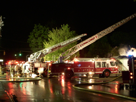 http://www.garrettharding.com/photos/Nikon Results May 2007/4 West Concord Fire - Two Ladder Trucks small.jpg